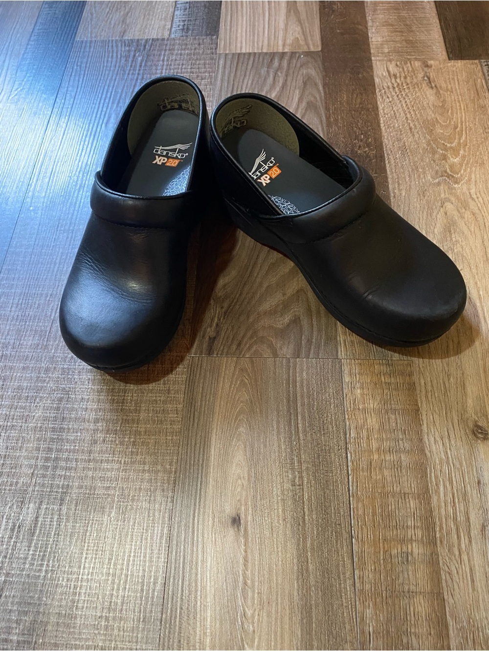 Dansko Black Leather Slip-On Clogs
